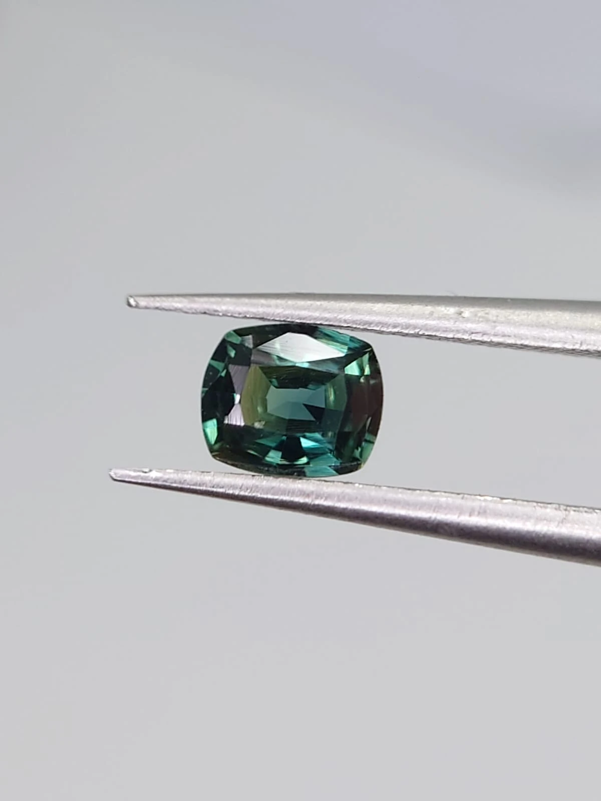 0.4ct Natural Bluish Green Sapphire from Nigeria — view 5